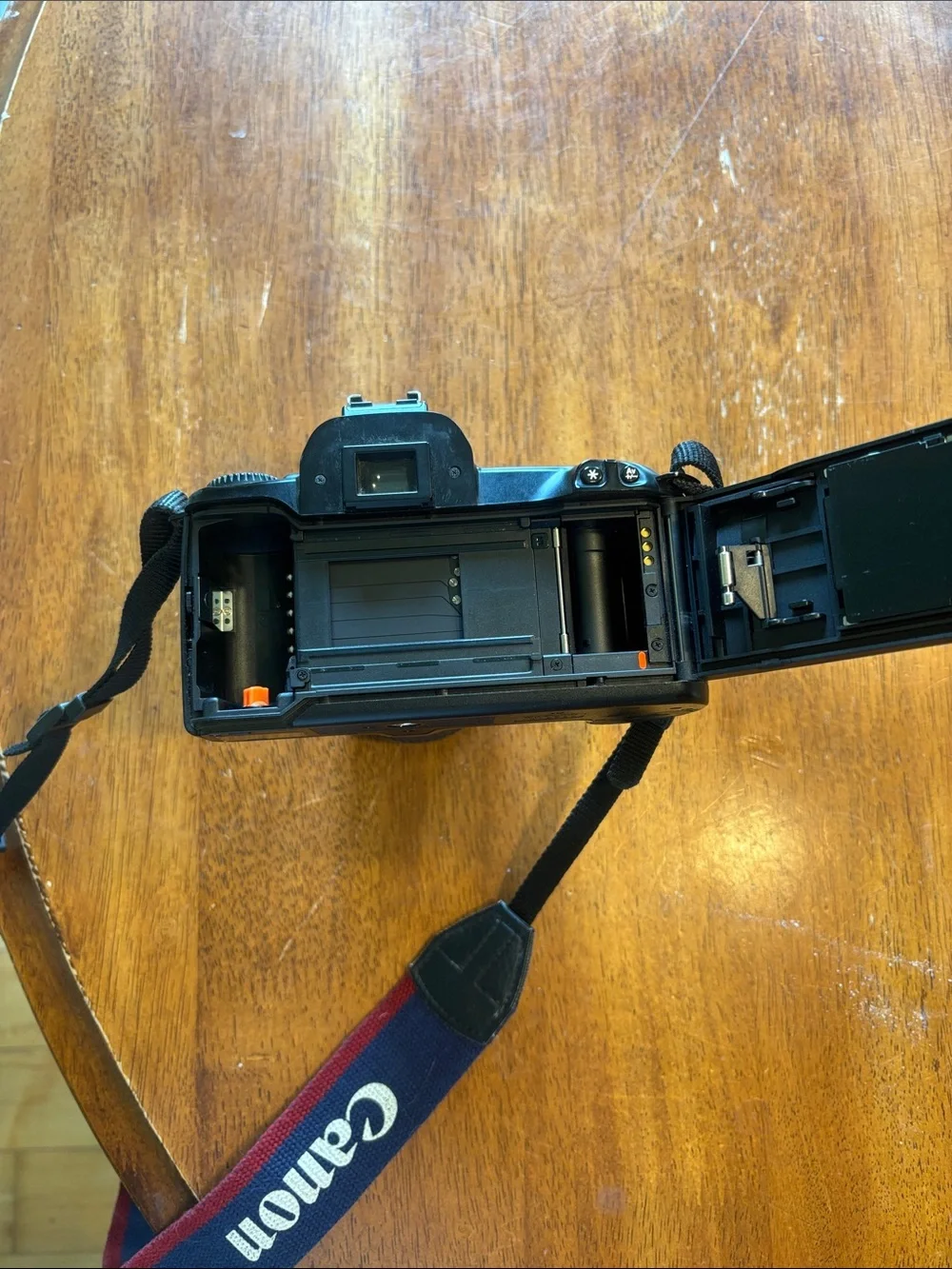 Canon Rebel X Black DSLR Camera with Navy and Red Strap